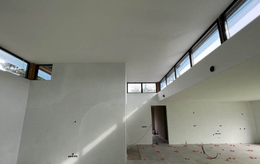 Mc-Home B155 levensloopbestendig modern hoog plafond glas en  natuursteen staalframebouw Nederland