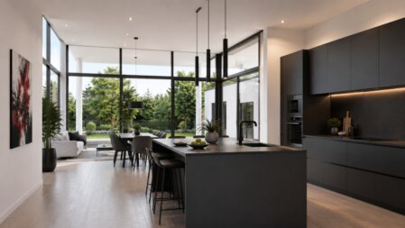 u ziet een foto van een moderne keuken en woonaker 