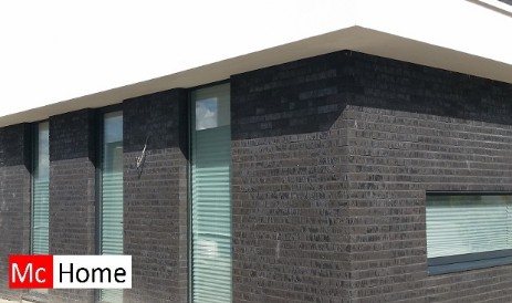 Mc-Home.nl moderne woningen in staalframebouw gevelbekleding Steenstrips met gevelstuck